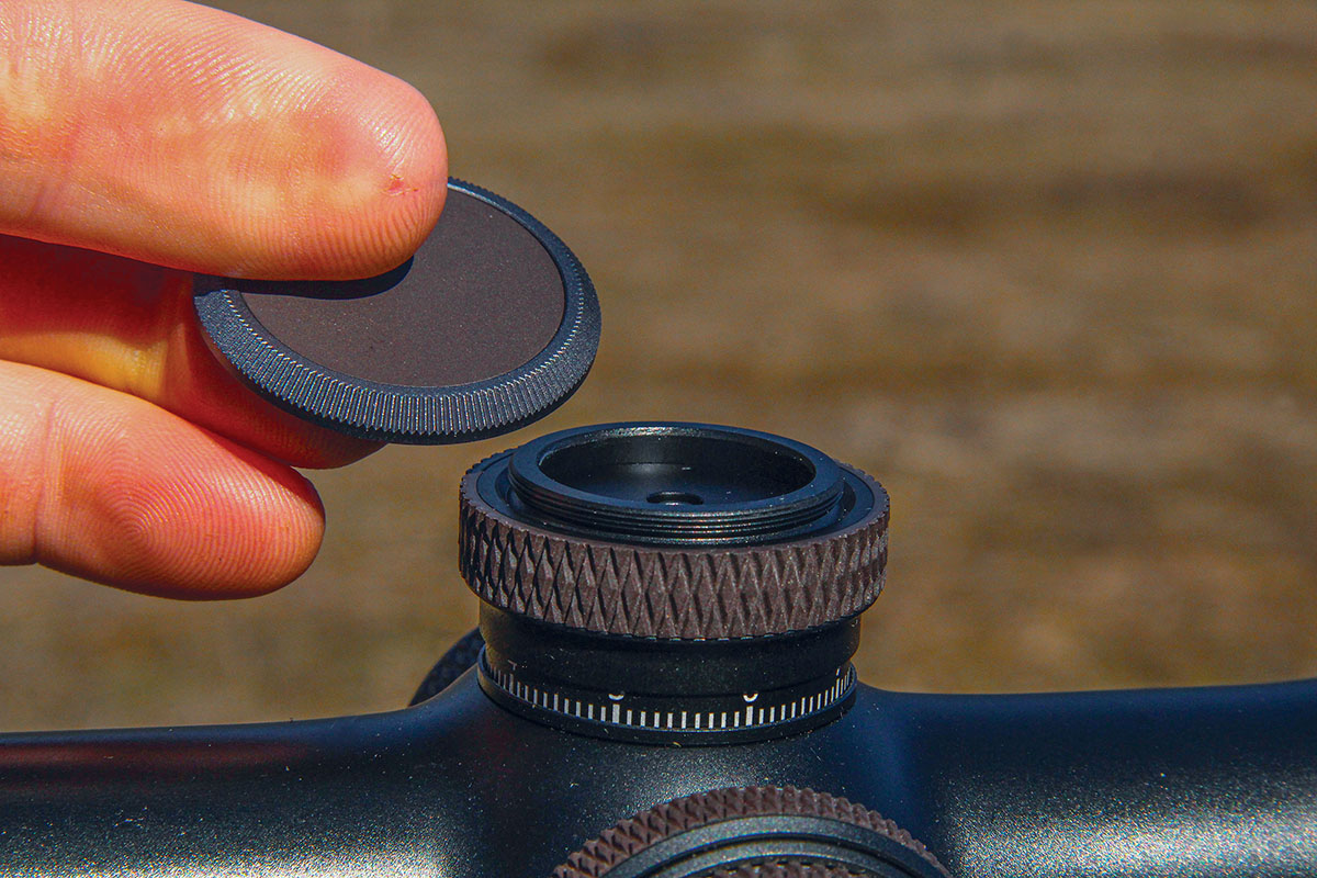 A top edge-knurled cap can be removed with your fingers to gain access to the return-to-zero function following sight-in.